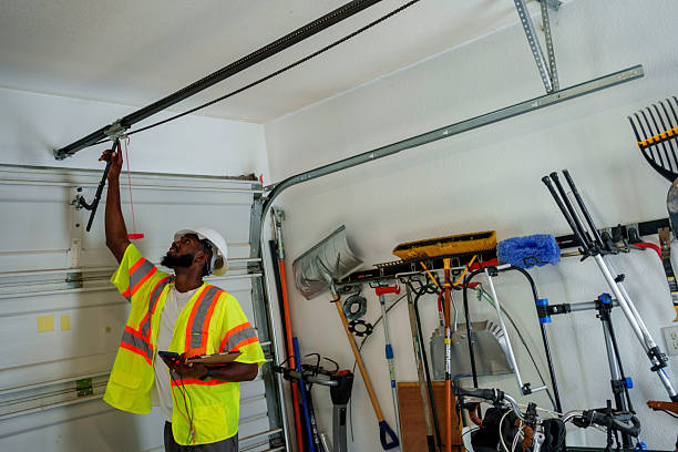Professional Garage Door Panel Replacement technician working in Dale, IN